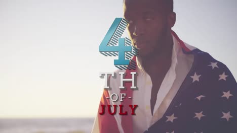 african american wearing us flag with independence date in front