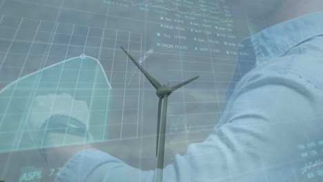 animación de datos financieros y empresario sobre la turbina eólica