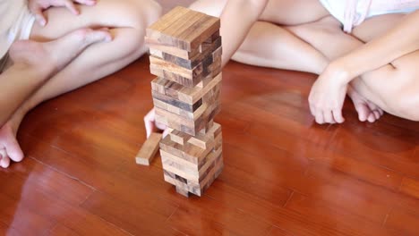 sequence of jenga tower building and falling