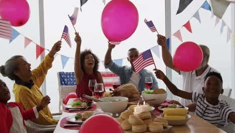 multi-generation family having celebration meal