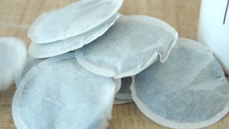 tea bags on a wooden table