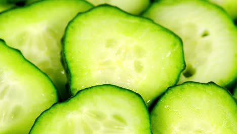 ripe green sliced cucumbers. juicy ripe green cucumber sliced