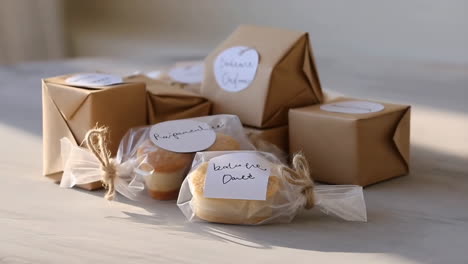 assortment of individually wrapped gifts and baked goods