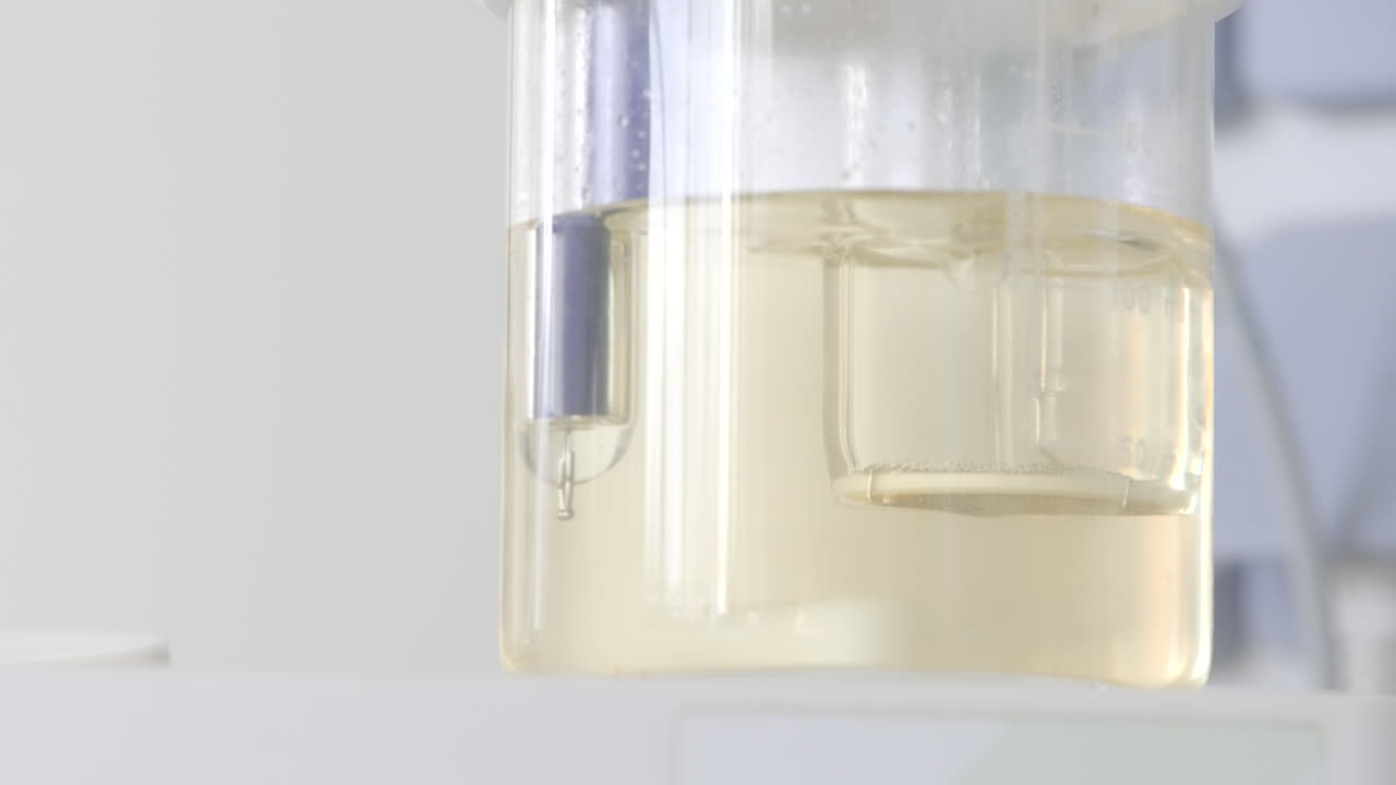 Laboratory Glassware with Solution and Probe