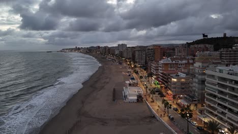 spanish coast of torreblanca at twilight with a stormy sky