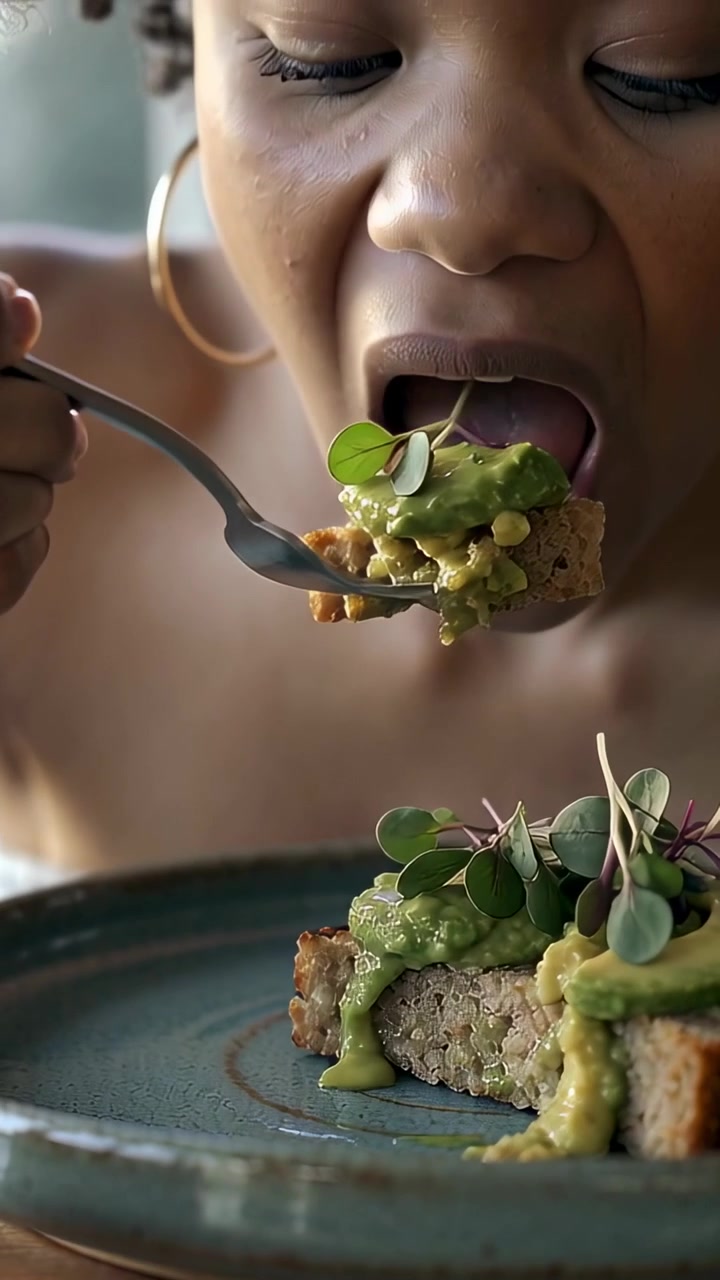 Vertical video: Piercing grain patty with fork, woman in strap top tasting bite at table