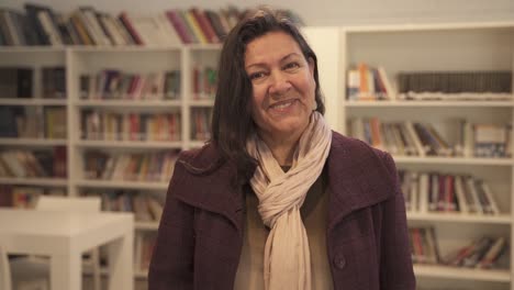 aged argentinian librarian posing for a portrait lifestyle picture