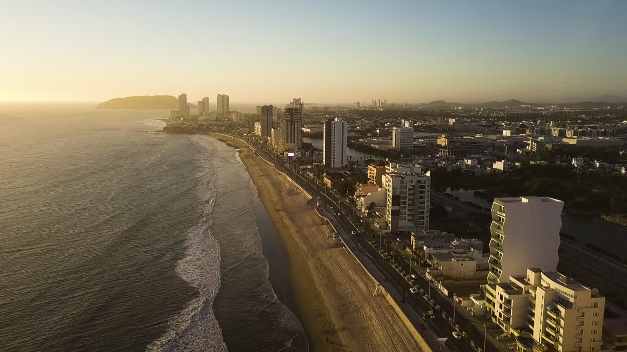 Golden hour sunset or sunrise urban beach in Mazatlan, Mexico