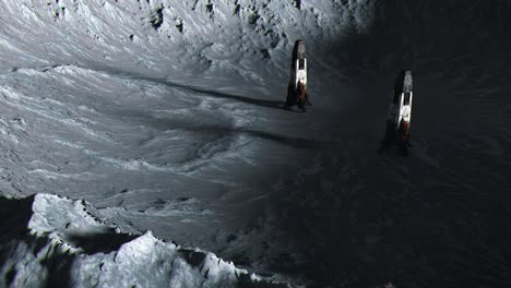 establishing shot of two space rockets on the surface of the moon