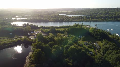 aerial drone 4k footage over jablines international park lakes at a bright sunny sunrise