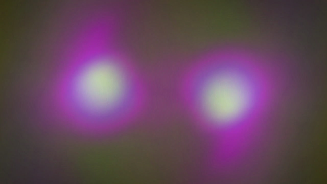 Blurred Purple and Green Light Transition Background