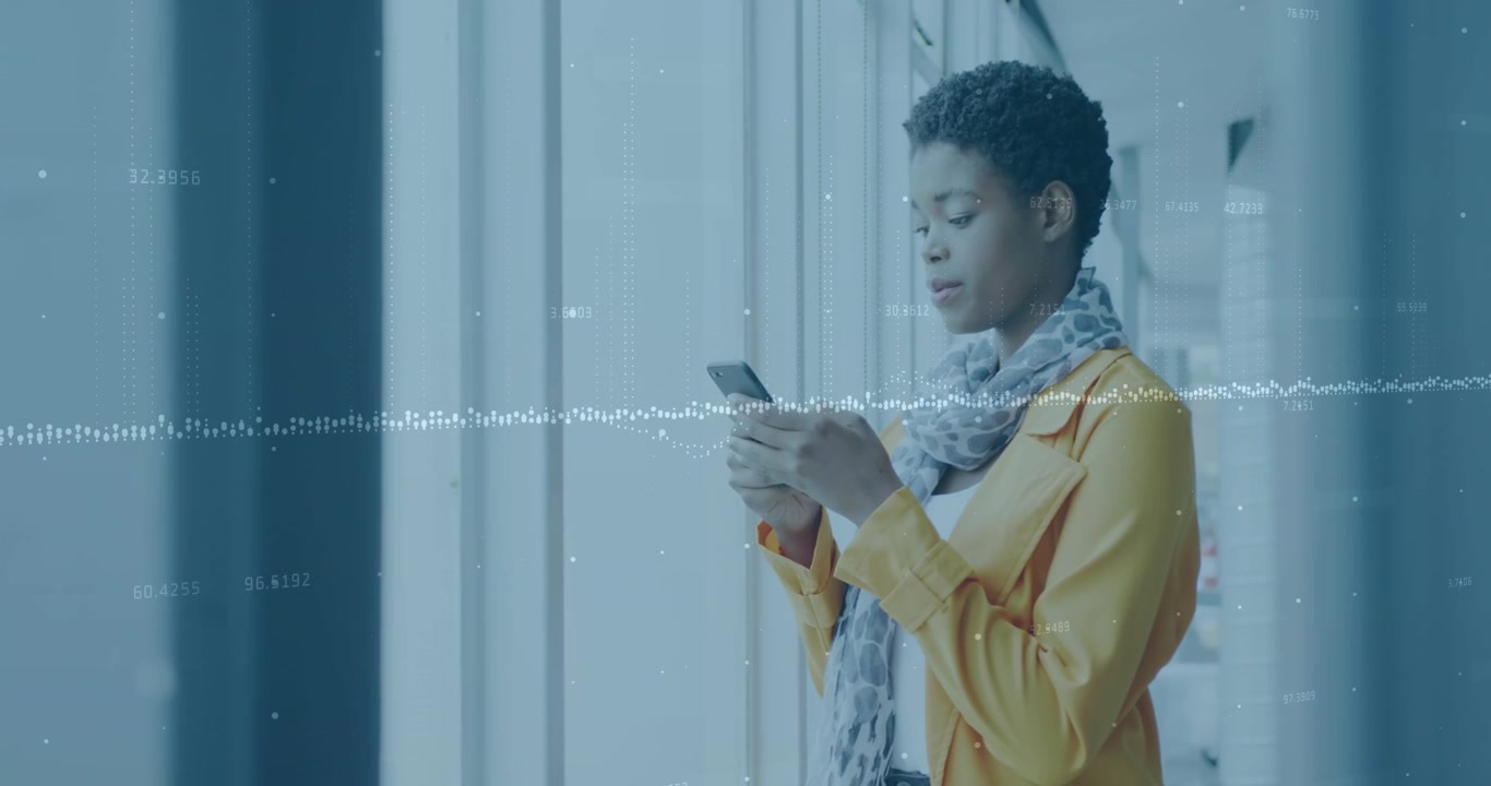 Animation of financial data processing over businessman using smartphone in office