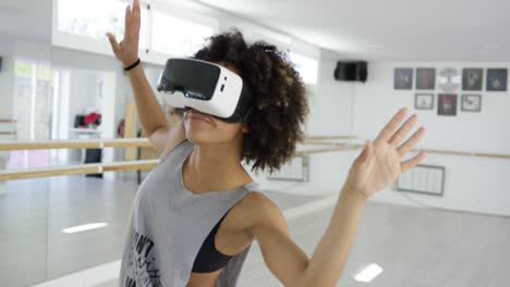 african american girl using vr glasses