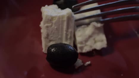 serving of feta cheese and black olives