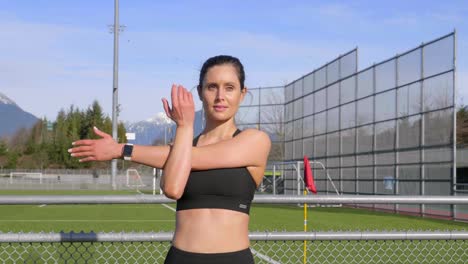 athletic woman stretching before her exercise routine