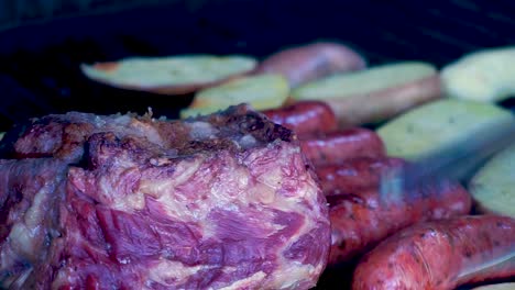 Closeup-shot-grilled-meat-with-chorizos,-cheesetop-tortillas,-guatemalan-beans-and-grilled-potatoes-smoking-and-juicy-preparation-ready-to-eat-family-at-a-summer-season-day-[HD1920-x-1080]-fps-29