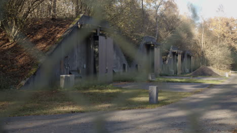 Munition-bunkers-behind-fence---close