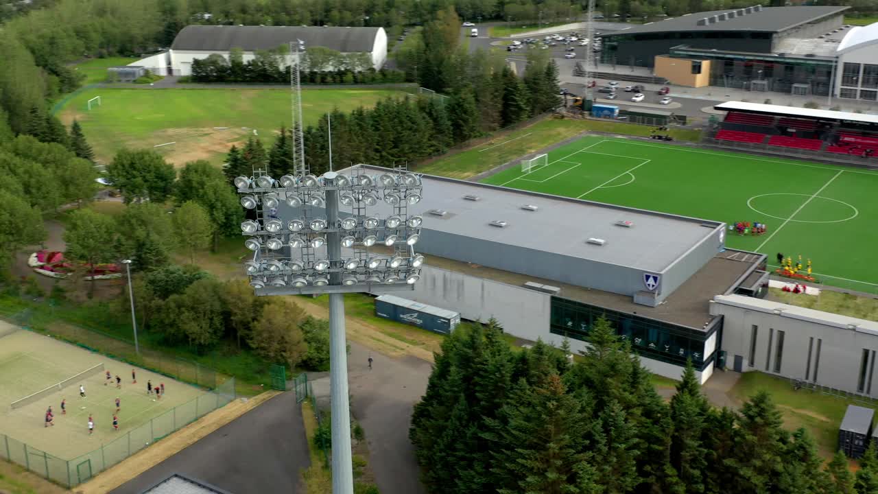 Drone shot of soccer fields in an urban neighborhood, The National Olympic and Sports Association, Laugardalsvollur Soccer Stadium