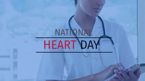 animation of national heart day text over caucasian female doctor