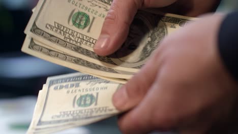 Close-up-of-male-hands-counting-money.-Personal-savings.-Money-cash-payment