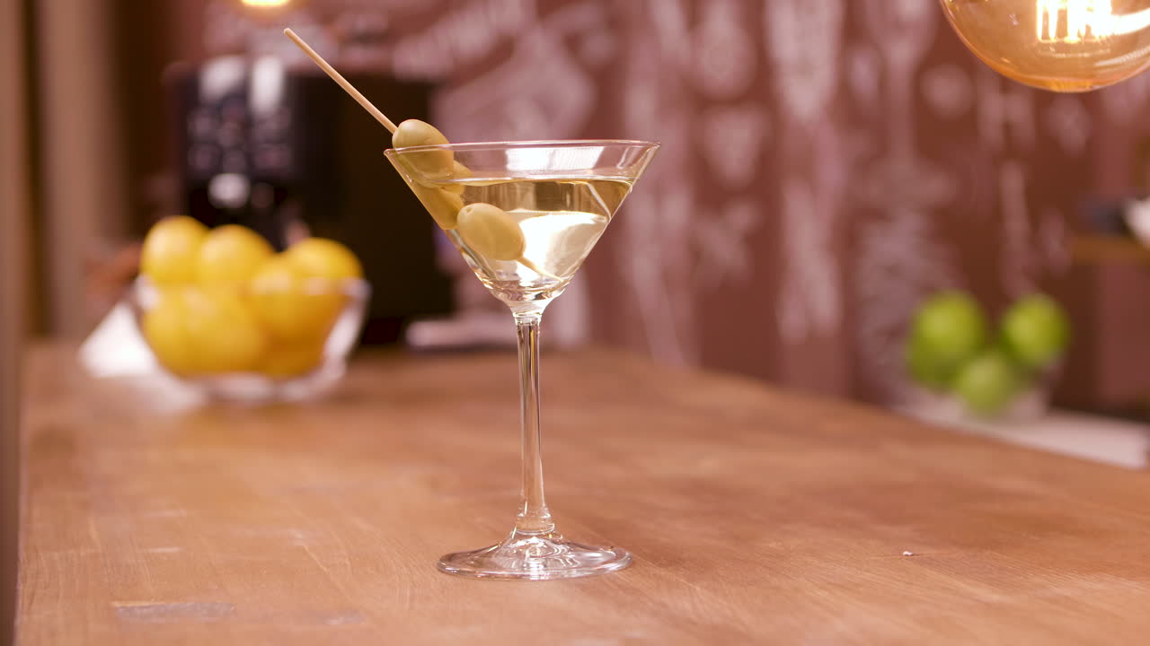 Martini with Olives on a Bar