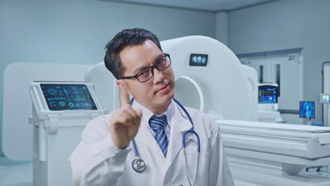 close up of asian male doctor showing no gesture while standing with mri machine in the hospital