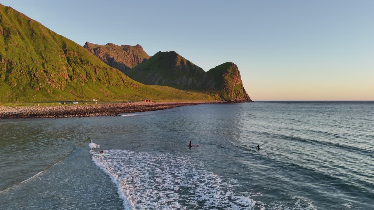 Aerial footage of Unstad, a remote surfing paradise in northern Norway’s Lofoten Islands. Nestled between high mountains and featuring pristine white sand beaches, far above the Arctic Circle