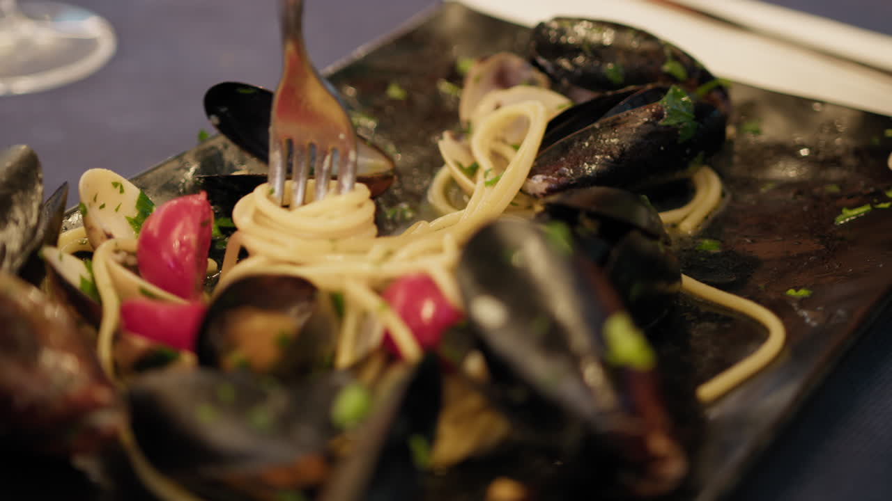 Fork Rotating And Grabbing Spaghetti Inside The Gourmet Dish