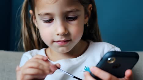 a young girl using her phone