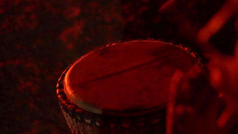 Close-up-of-human-hands-playing-the-drum,-Morocco-desert,-Africa