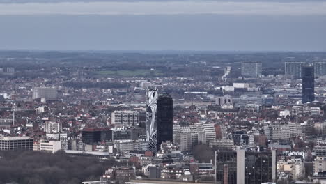 a cloudy panorama from above: brussels' legacy stands tall amidst its bustling