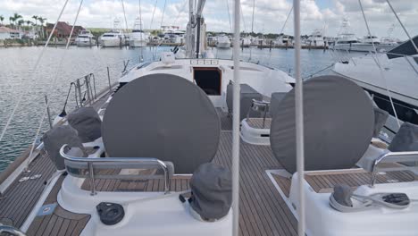 helms or steering wheels, instrumentation and furnishings of sailboat covered with fabric covers