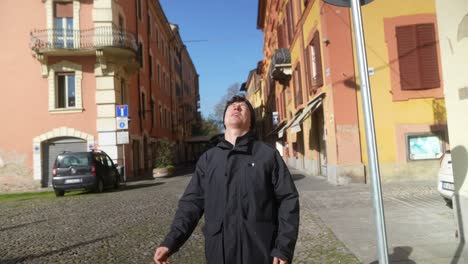 man walking on a city street