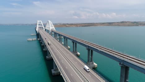 aerial view of a modern bridge spanning a body of water