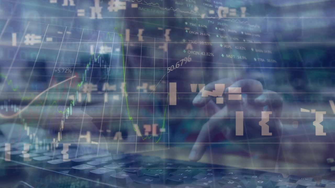 Person Typing on Keyboard with Digital Financial Data Overlay