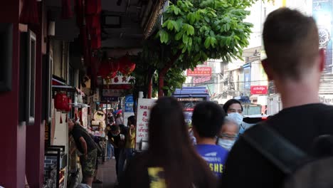 pedestrians navigating a crowded city sidewalk