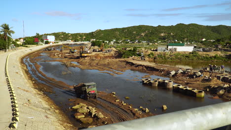 Scene-of-construction-of-riverbed-in-Vinh-Hy,-Vietnam