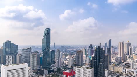 bangkok business district city center above silom area, with cloud pass over buildings and skyscrapers – time lapse