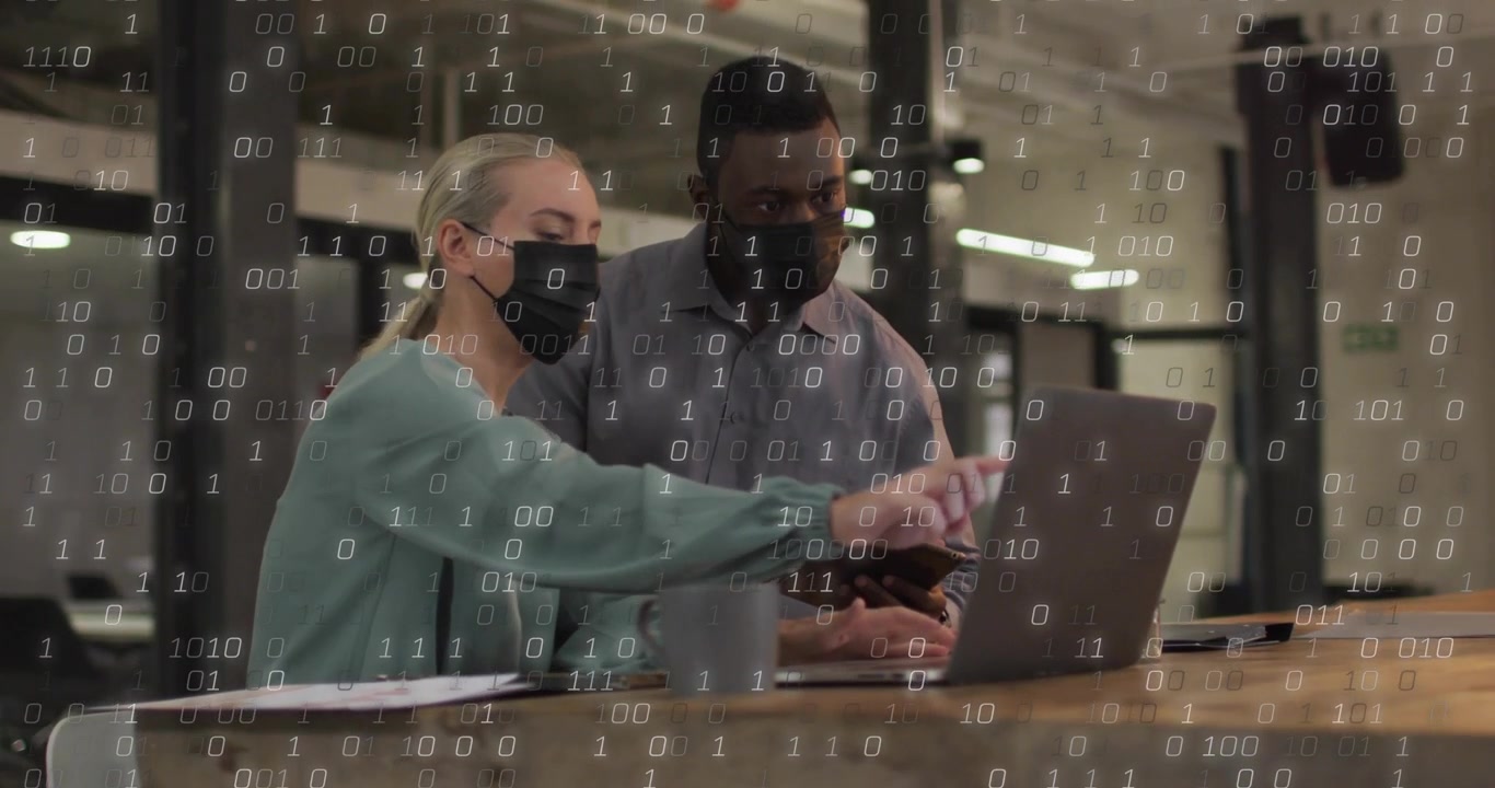 Woman typing and pointing at screen, man observing binary digits building for analysis