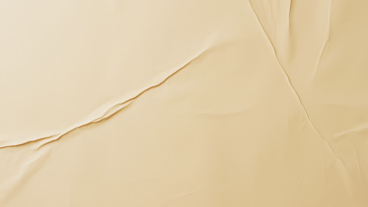 video de primer plano de tela arrugada amarilla con espacio para copiar