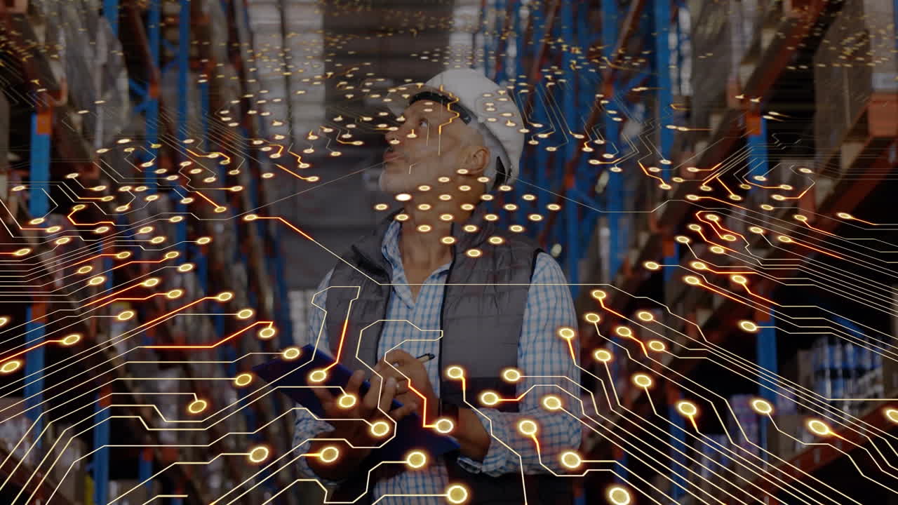Animation of network of connections over caucasian male worker in warehouse