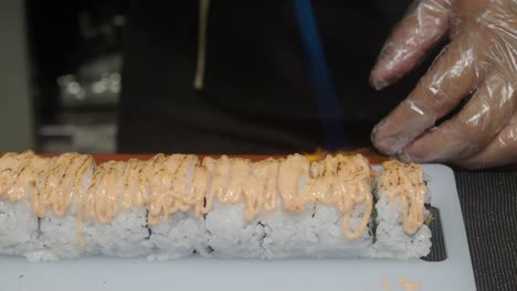 preparing sushi rolls