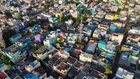 aerial footage of temple gopurams rising amidst densely packed buildings