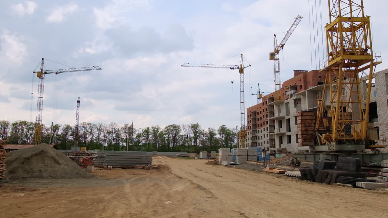 Building Site Under Construction with Cranes