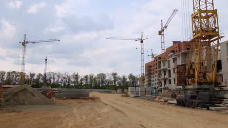 building site under construction with cranes