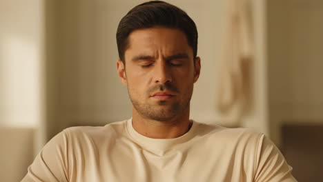 a man meditating with closed eyes