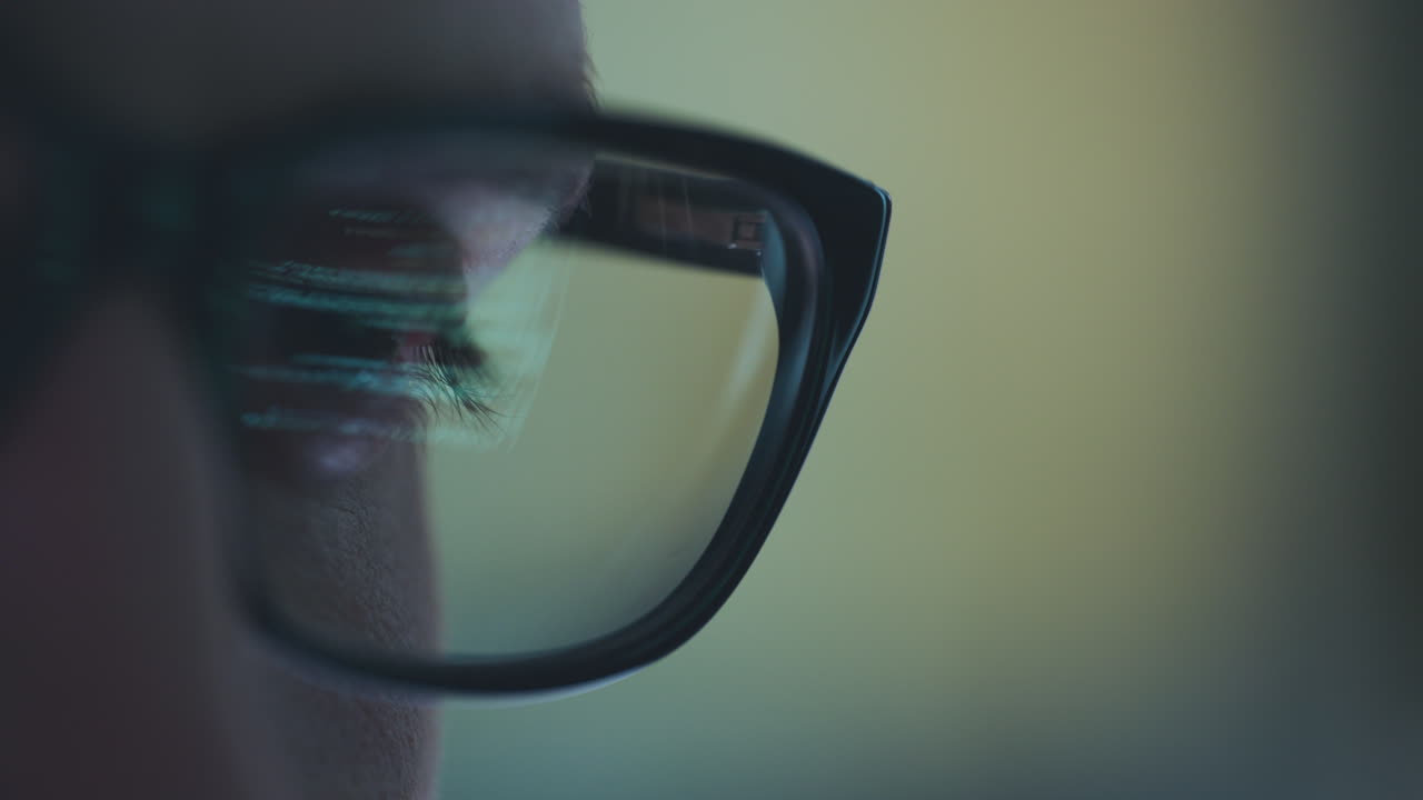 Close-up of Person Wearing Glasses