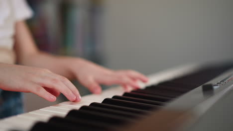 young female student engages in music lesson in light premise