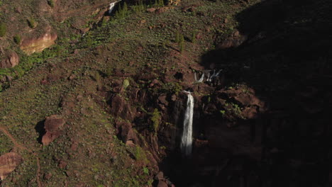 Fantastic-side-aerial-shot-of-a-beautiful-waterfall-caused-by-the-heavy-rains-of-Cyclone-Hermine-on-the-island-of-Gran-Canaria-recently