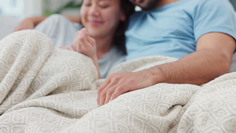 Relax,-blanket-and-holding-hands-with-couple